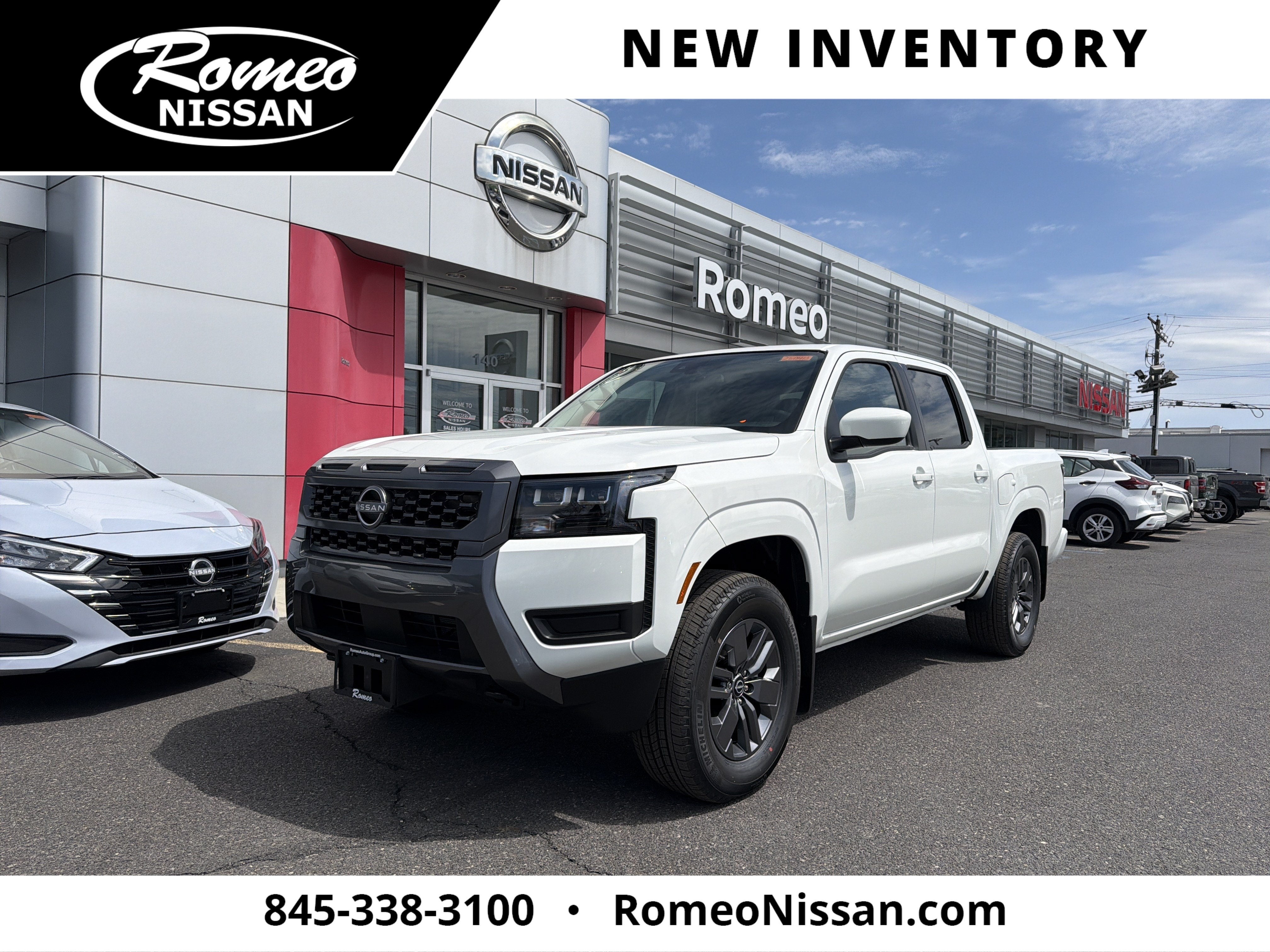 2026 Nissan Frontier SV in Glacier White — front three-quarter view
