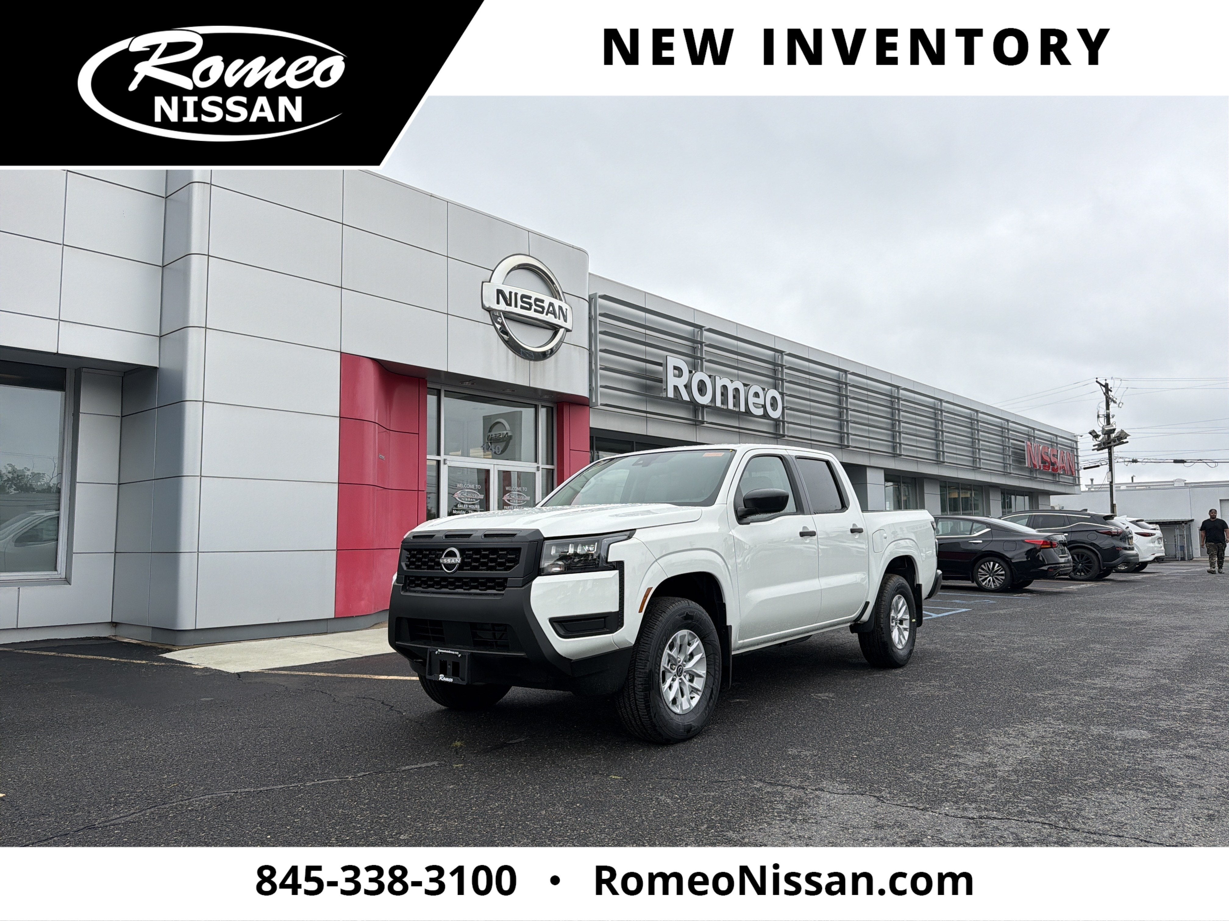 2026 Nissan Frontier S in Glacier White — front three-quarter view