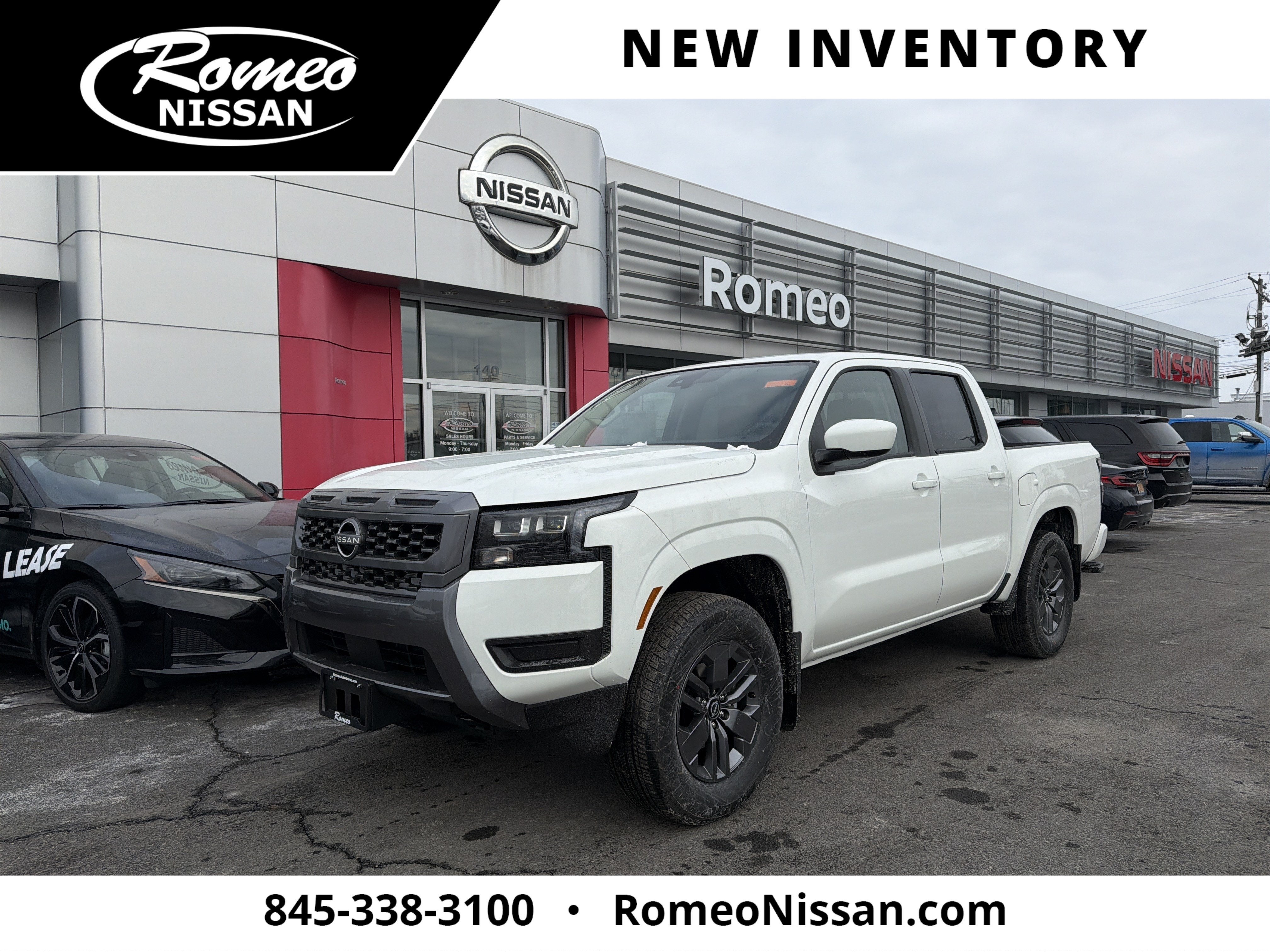 2026 Nissan Frontier SV in Glacier White — front three-quarter view