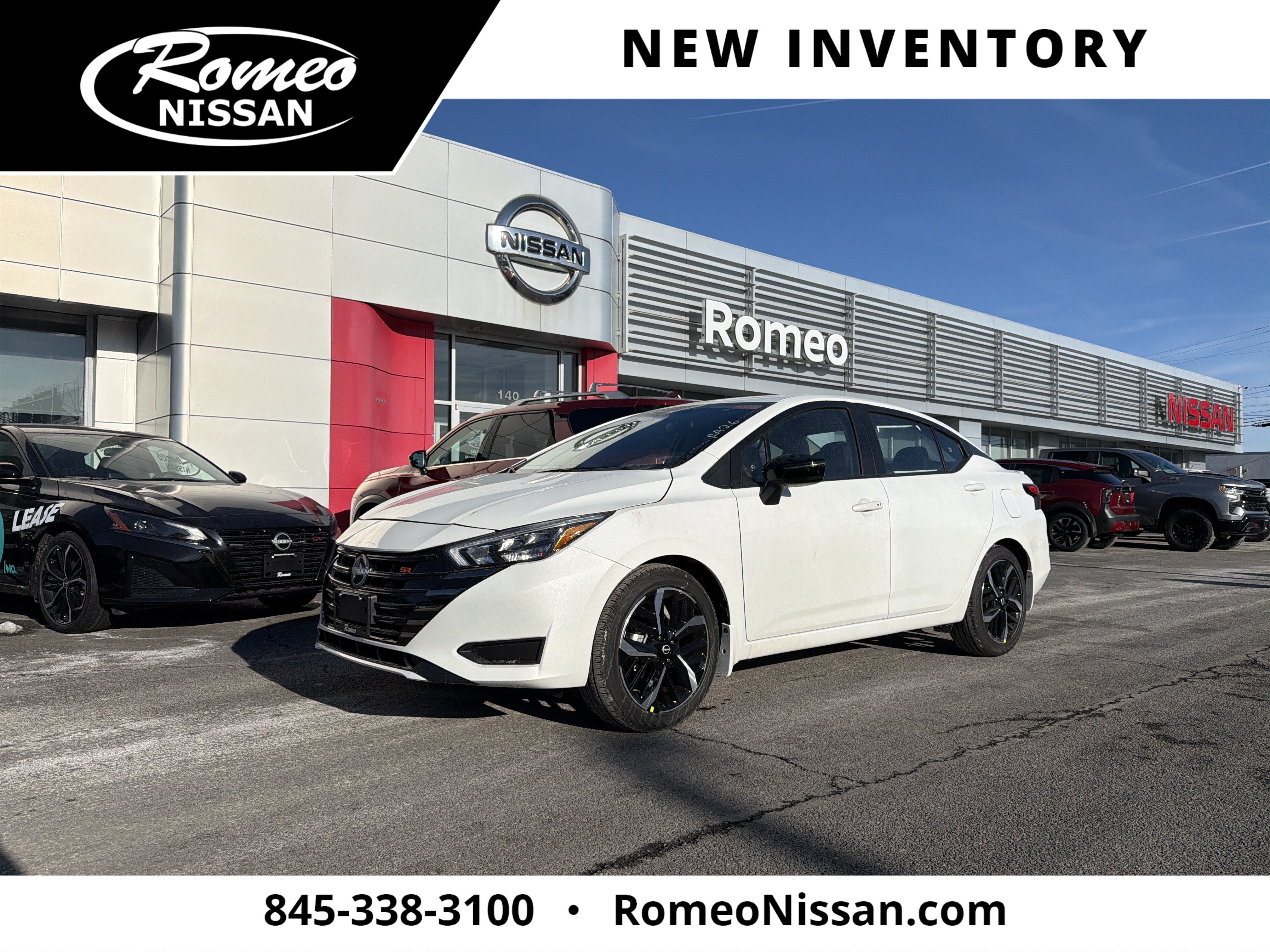 2025 Nissan Versa SR in Aspen White Tricoat — front three-quarter view