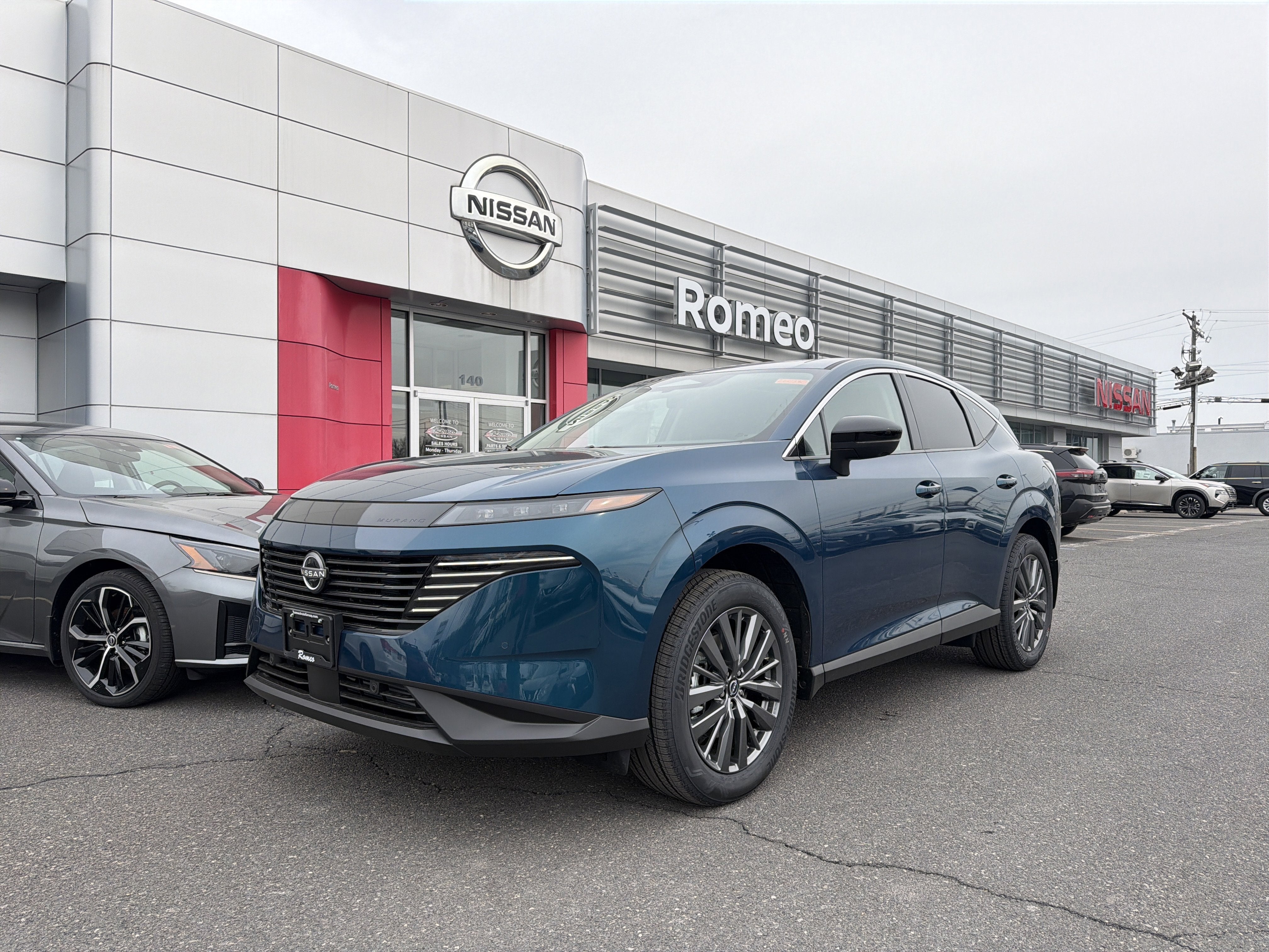 2026 Nissan Murano SL in Aurora Blue Pearl Metallic — front three-quarter view