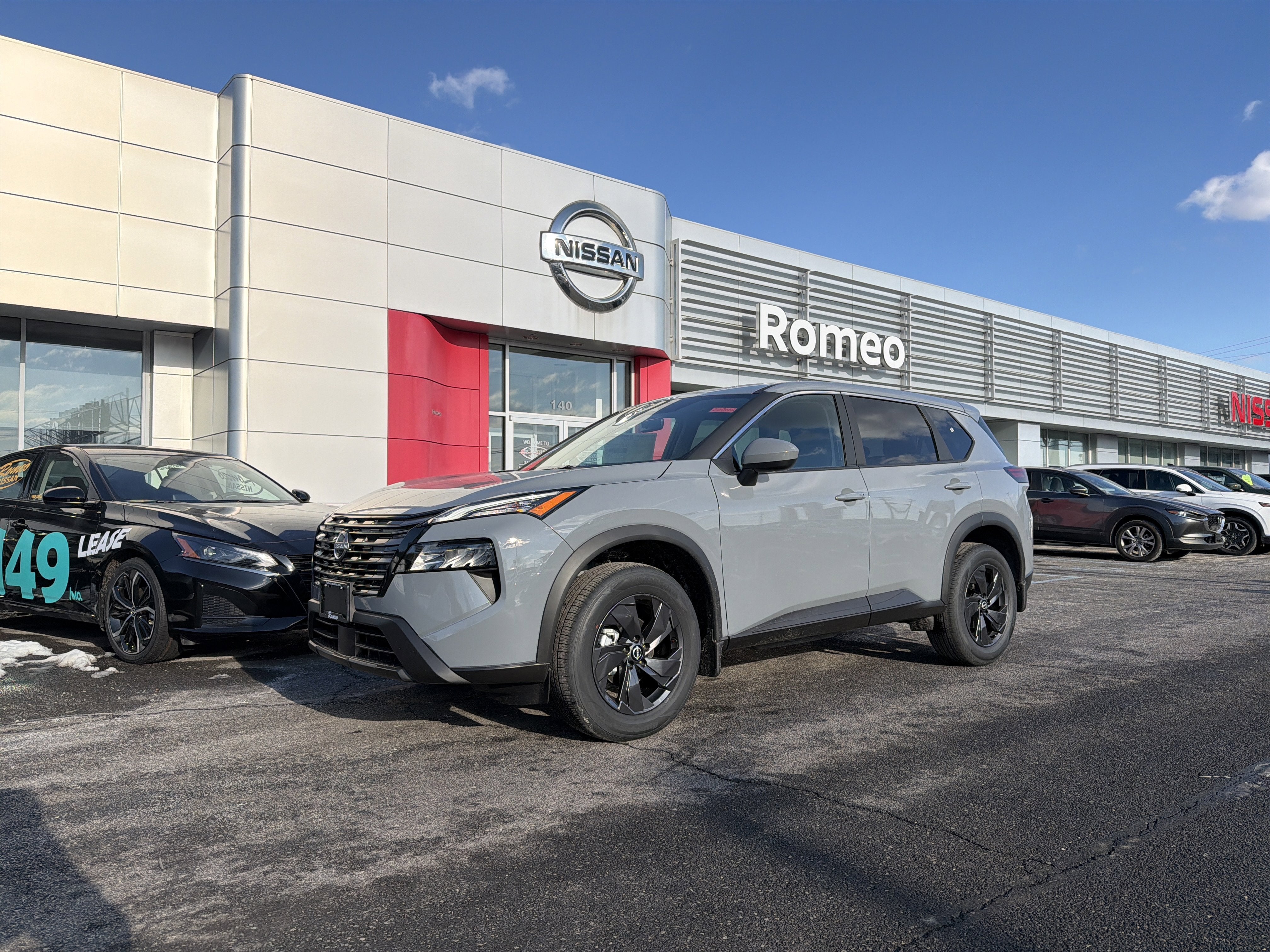 2026 Nissan Rogue SV in Boulder Gray Pearl — front three-quarter view