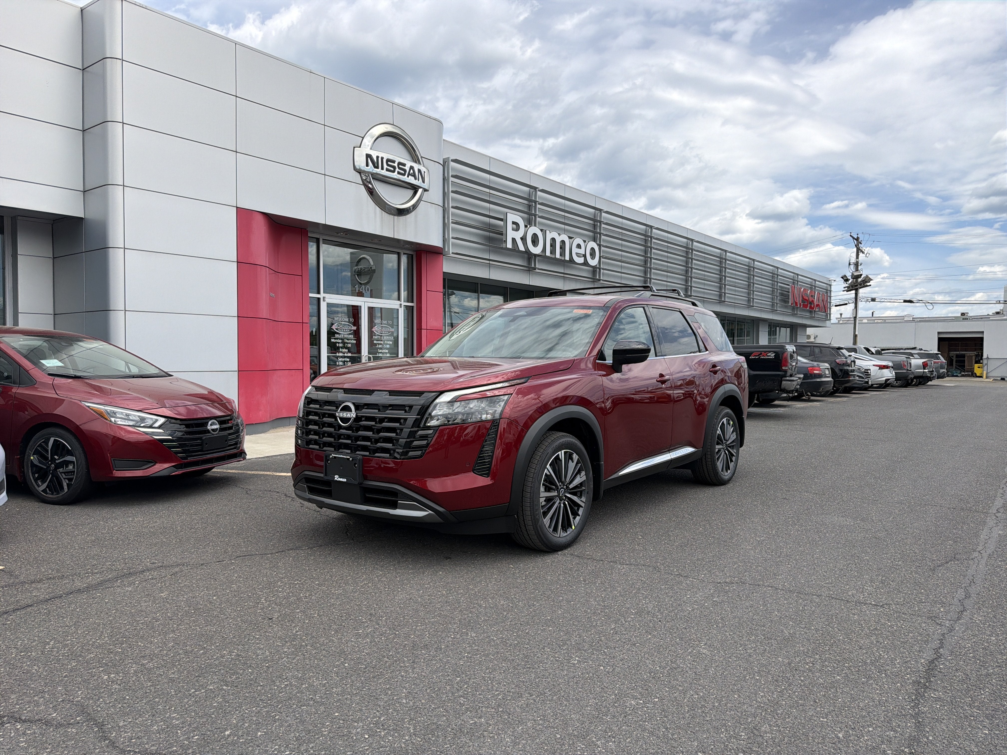 2026 Nissan Pathfinder Platinum in Scarlet Ember Tintcoat — front three-quarter view