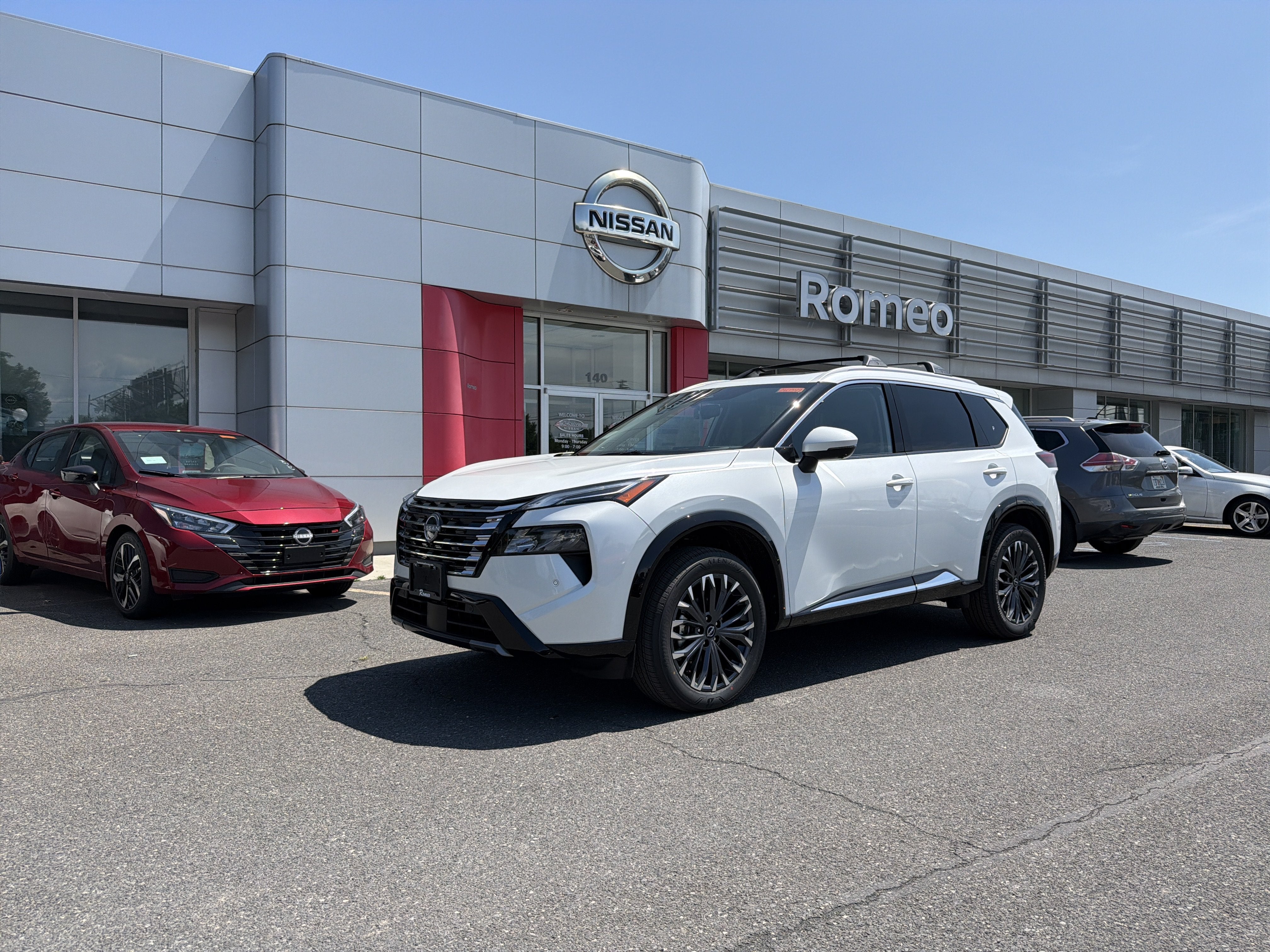 2026 Nissan Rogue Platinum in Everest White Pearl Tricoat — front three-quarter view