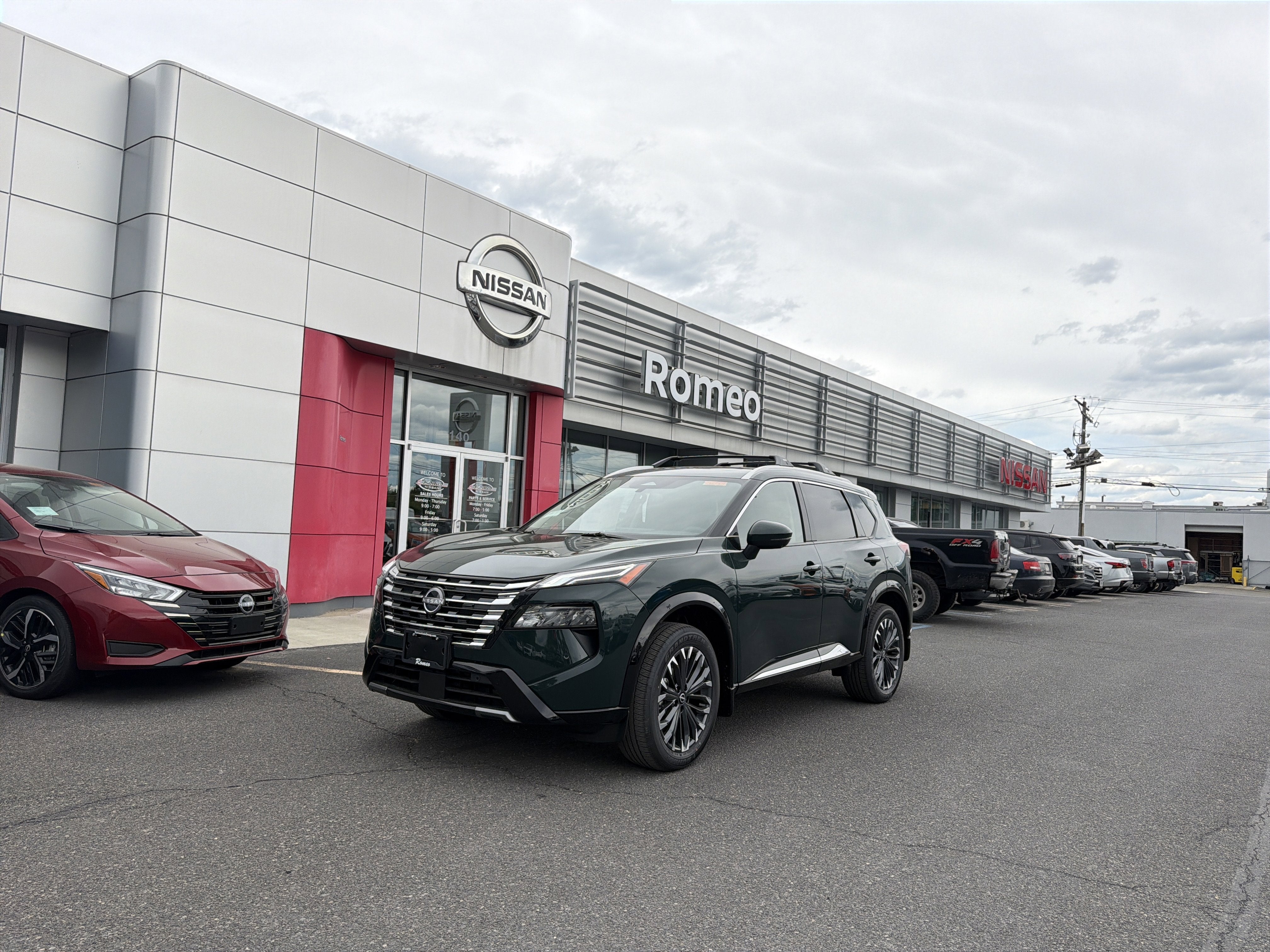 2026 Nissan Rogue Platinum in Obsidian Green — front three-quarter view