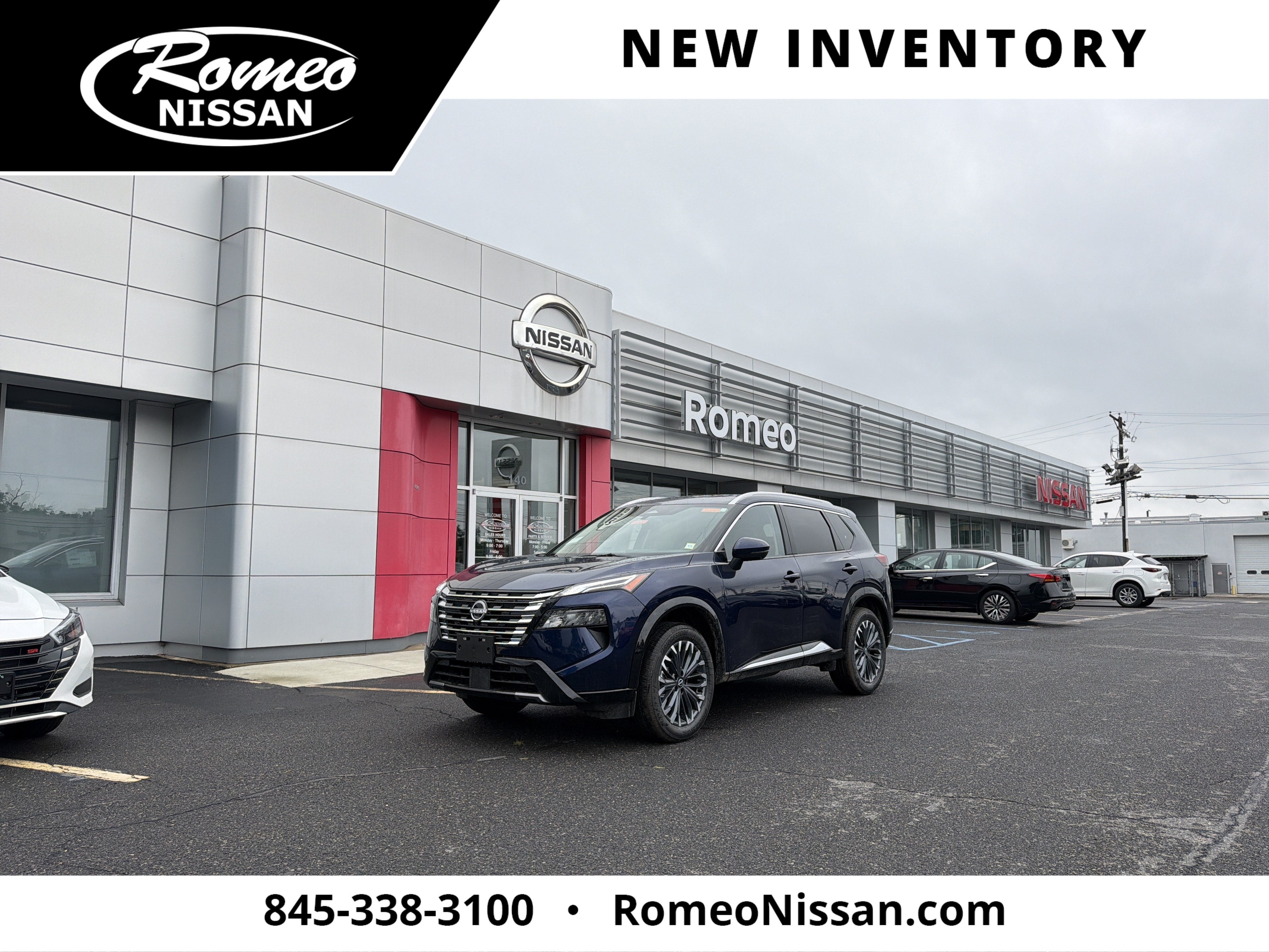 2026 Nissan Rogue Platinum in Deep Ocean Blue Pearl — front three-quarter view