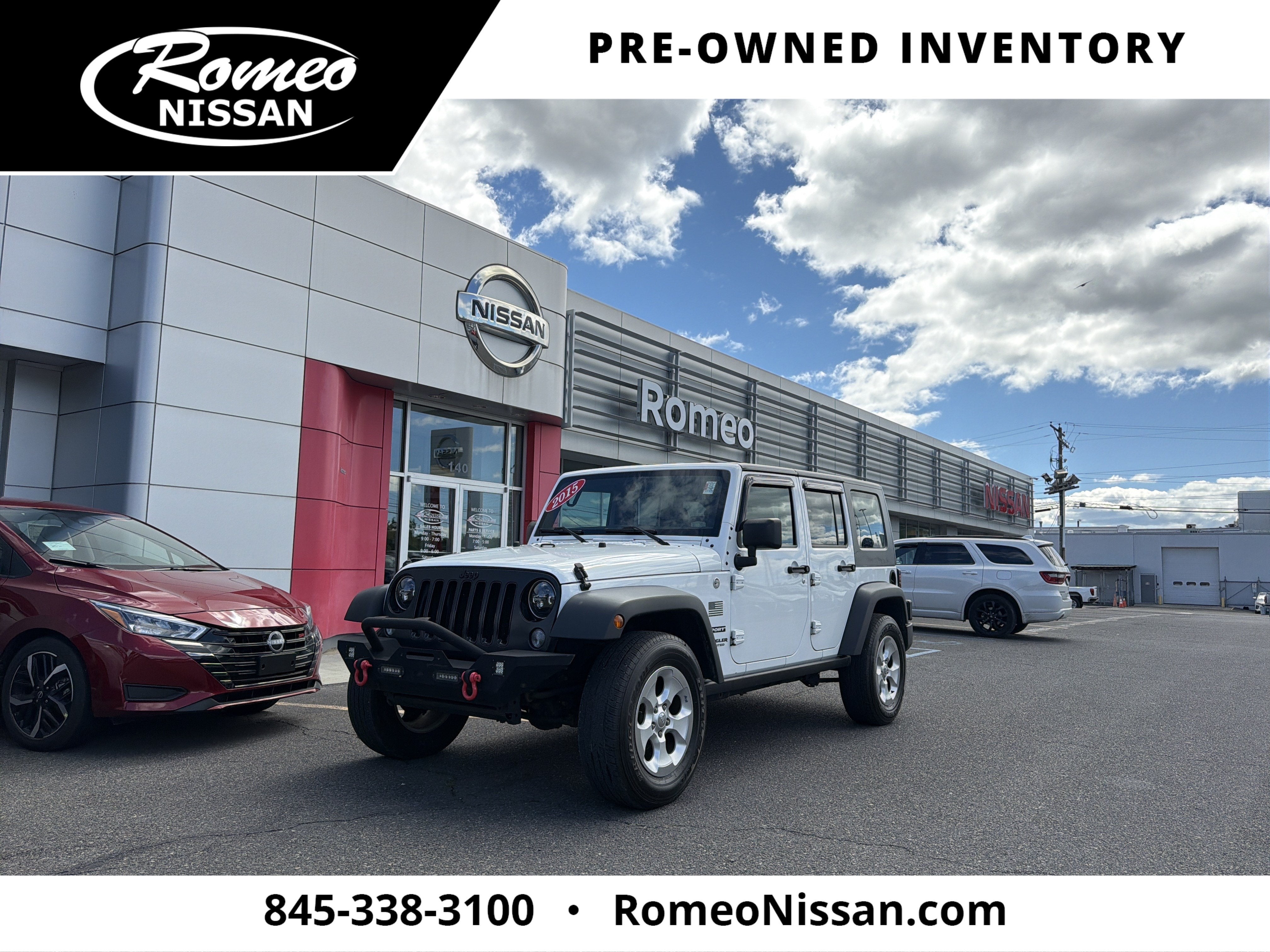 2015 Jeep Wrangler Unlimited Sport in Bright White Clearcoat — front three-quarter view