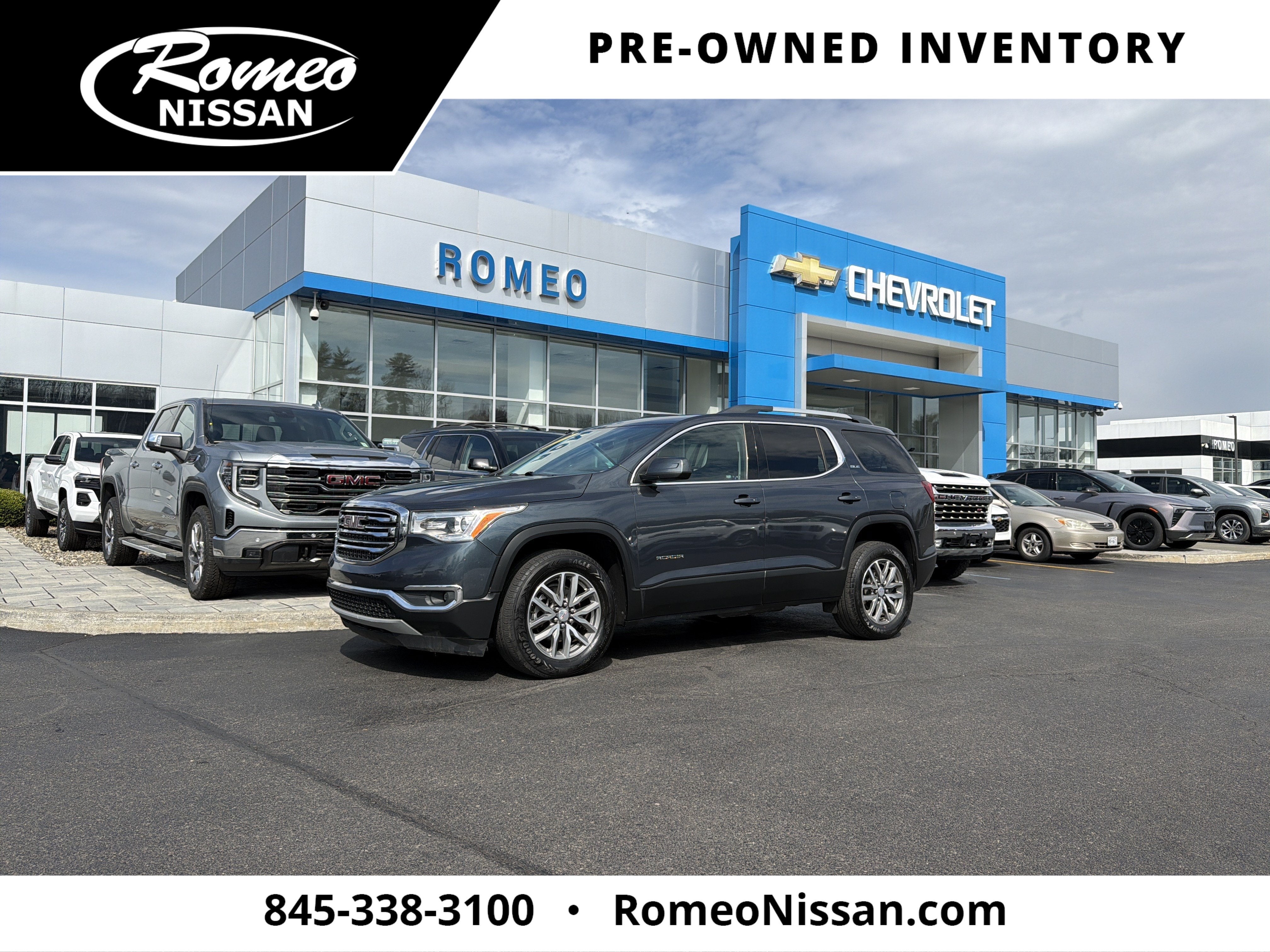 2019 GMC Acadia SLE-2 in Dark Sky Metallic — front three-quarter view