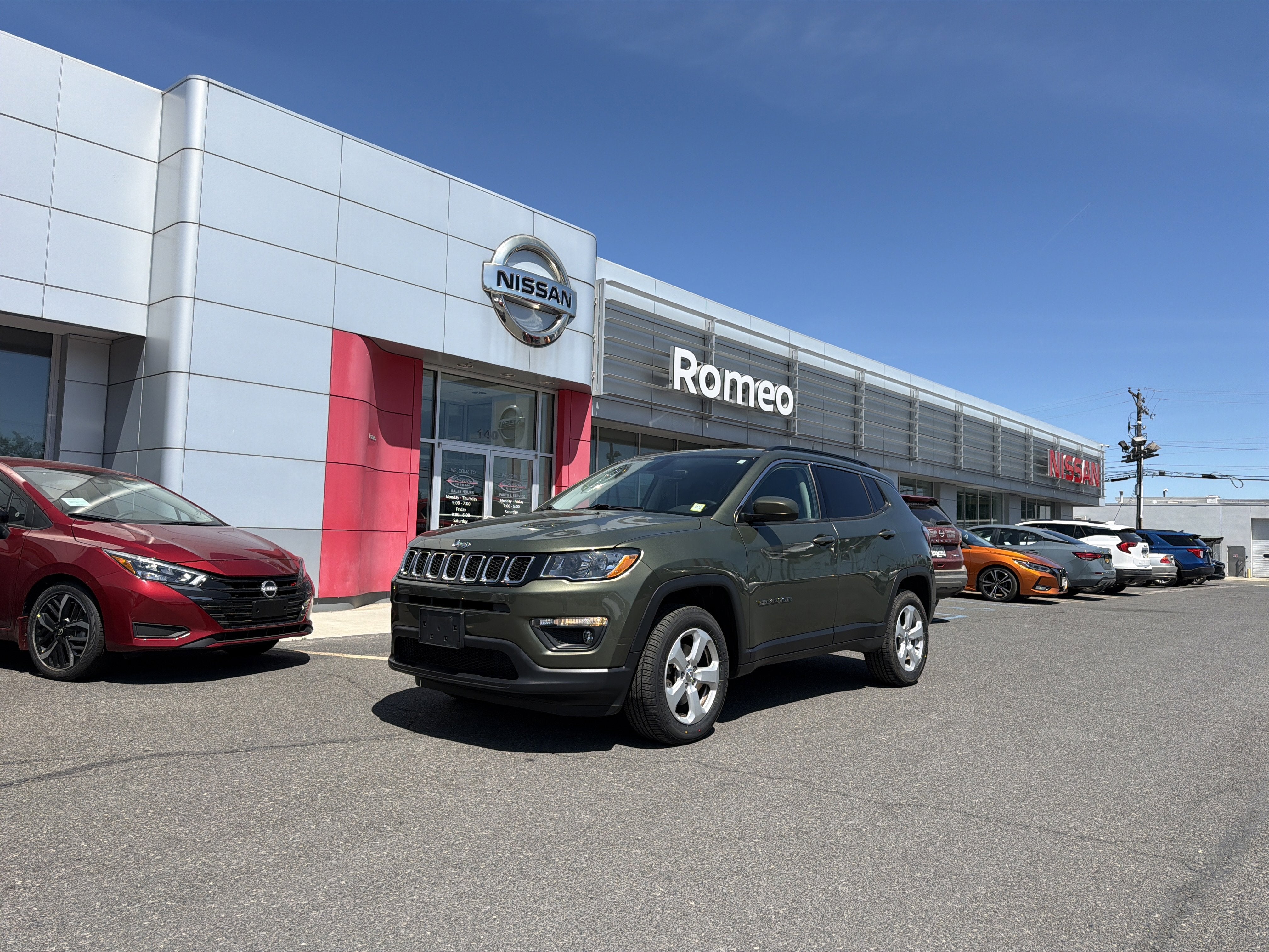 2020 Jeep Compass Latitude in Olive Green Pearlcoat — front three-quarter view