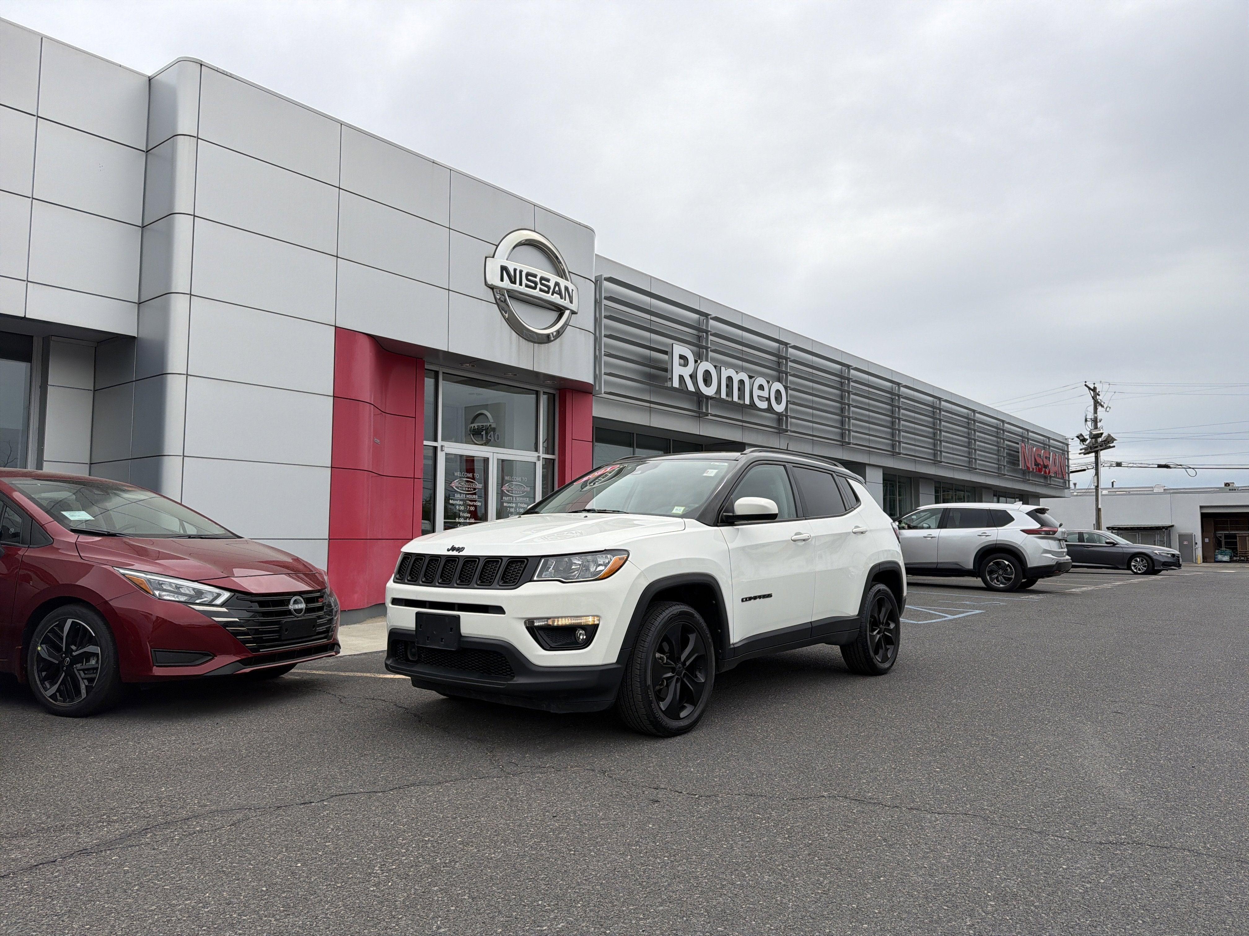 2021 Jeep Compass Latitude in White Clearcoat — front three-quarter view