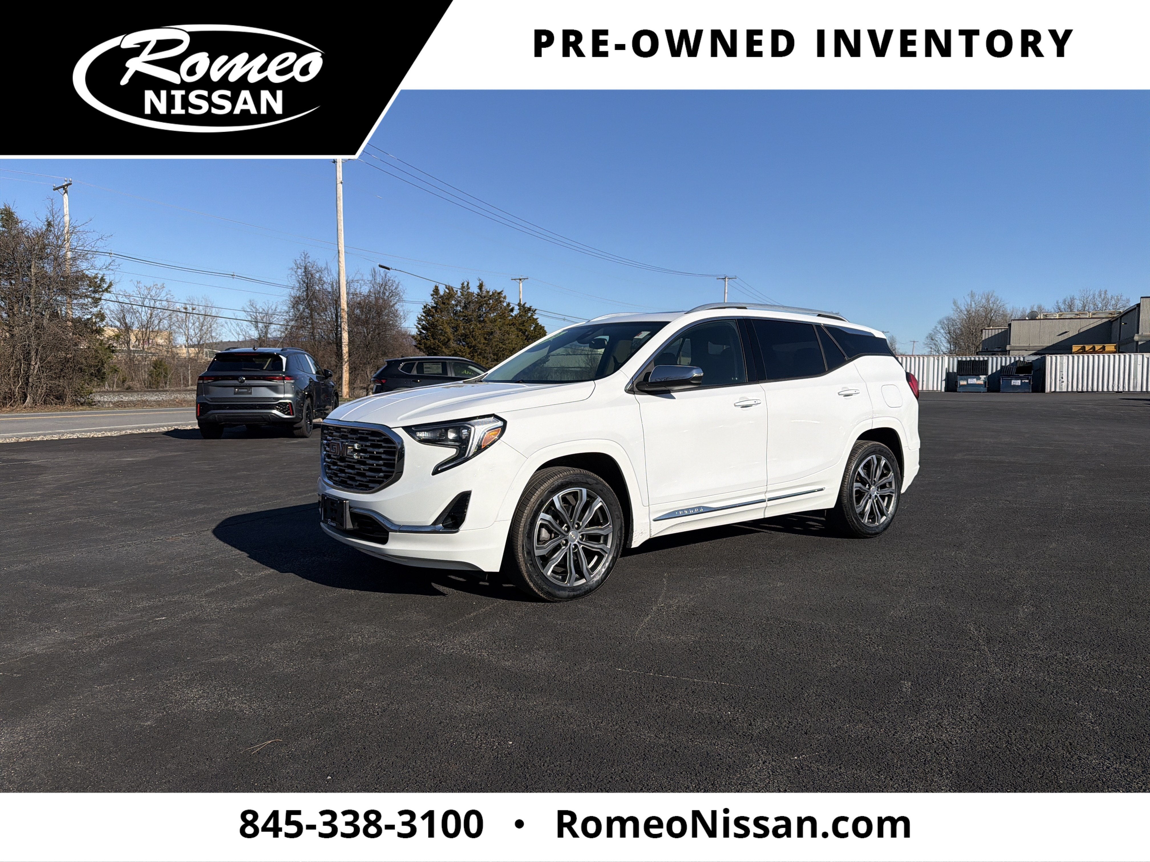 2019 GMC Terrain Denali in Summit White — front three-quarter view