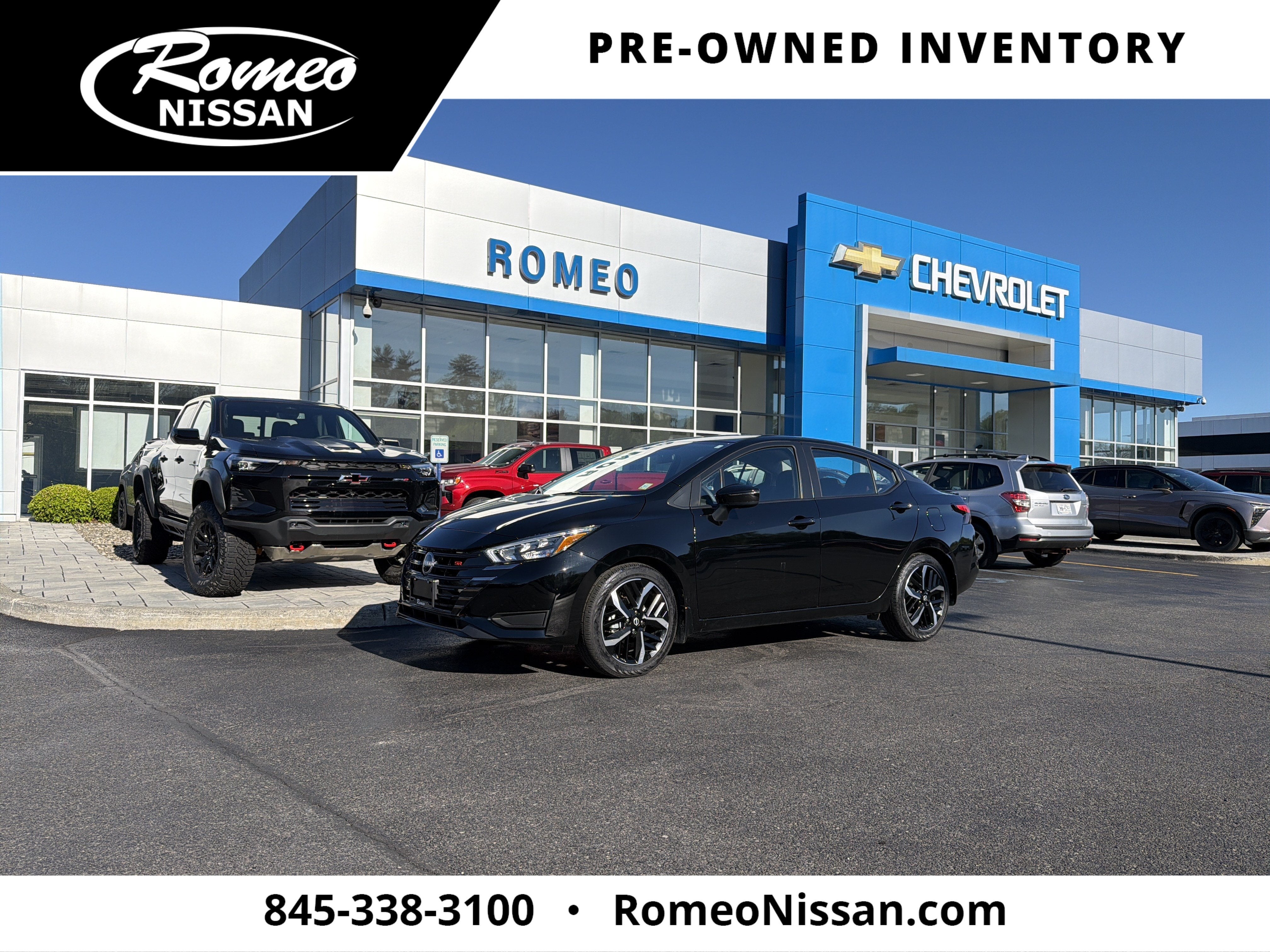 2025 Nissan Versa 1.6 SR in Super Black Metallic — front three-quarter view