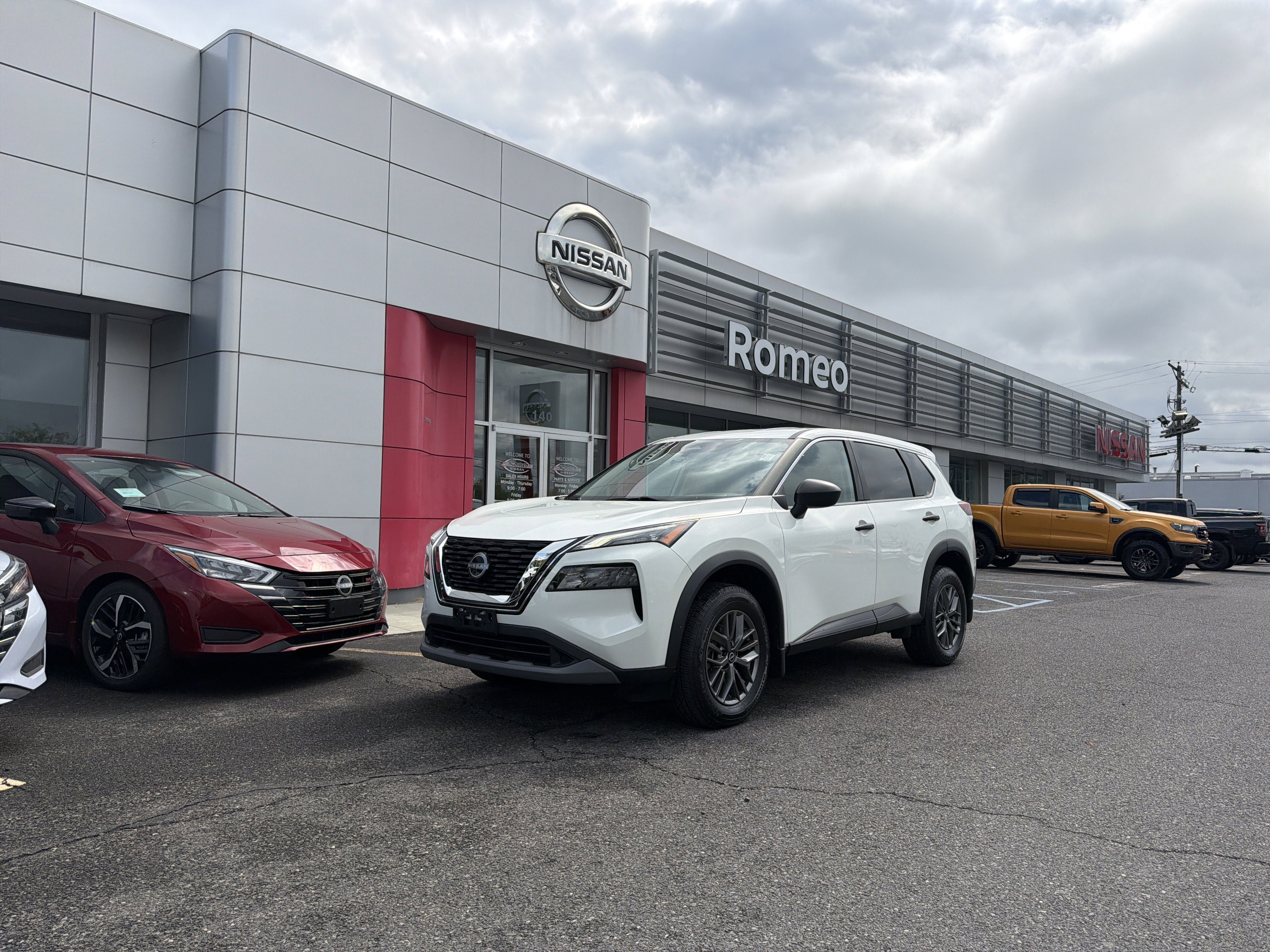 2022 Nissan Rogue S in Glacier White — front three-quarter view